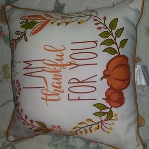 Double sided accent pillow